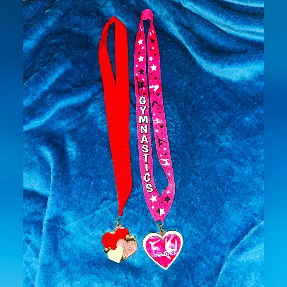 2 trophy medals